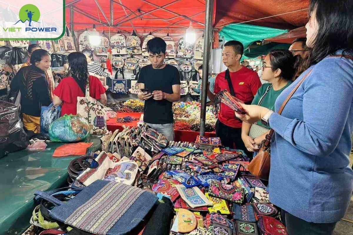 Buy bags, brocade wallets at sapa night market