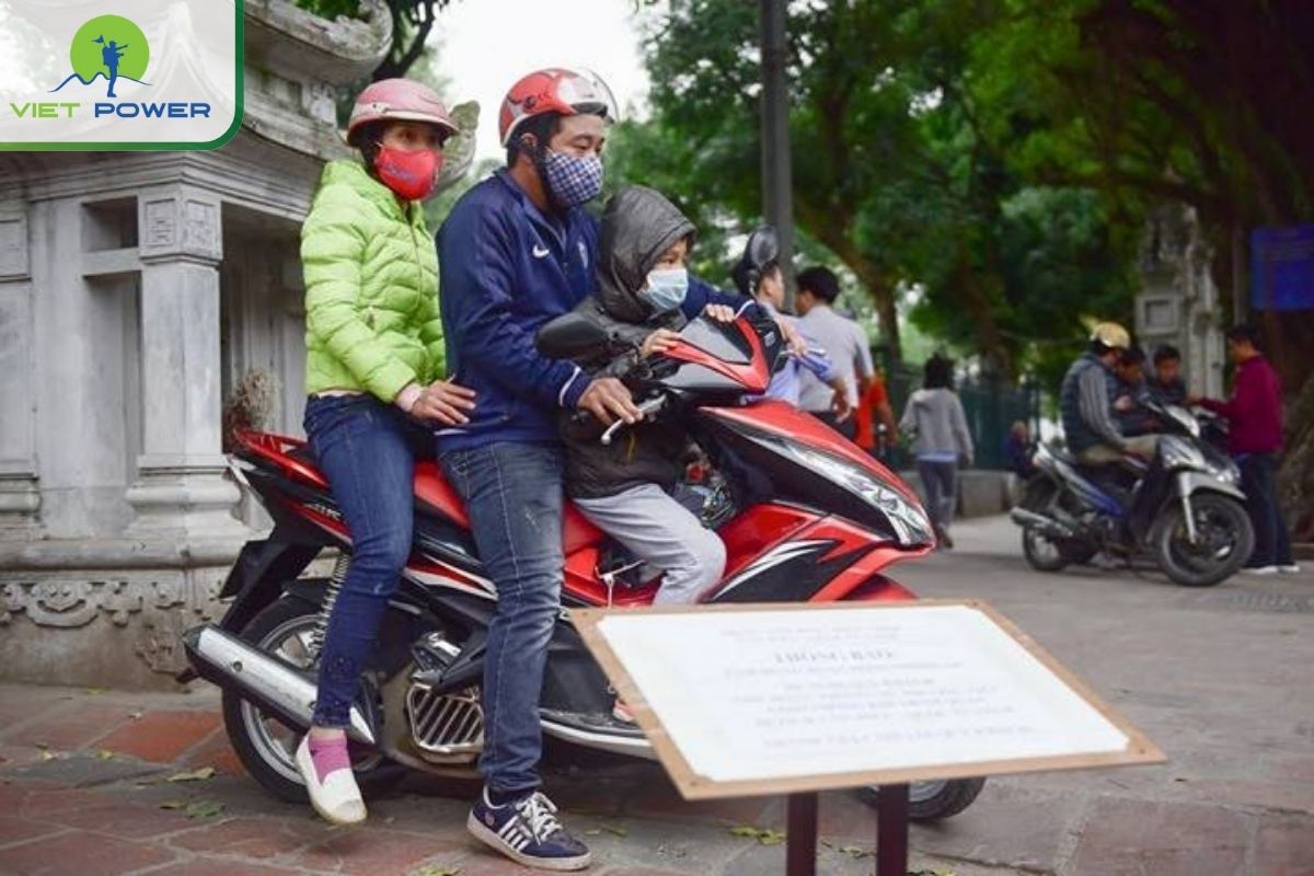 Ride a motorbike to the Temple of Literature