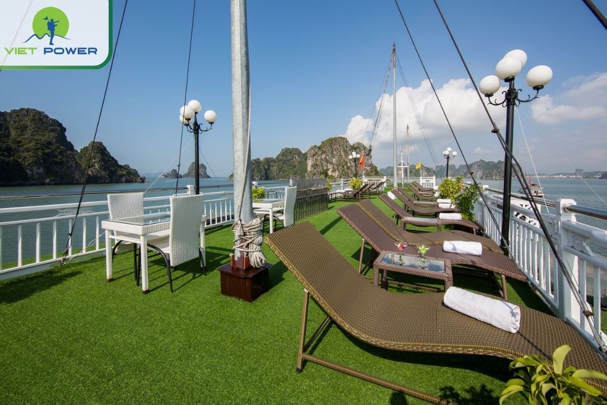 Relax on deck as the ship cruises through scenic islets