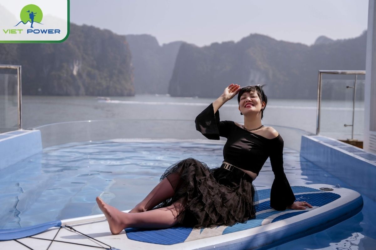 Refreshing moments at the glass-bottom swimming pool