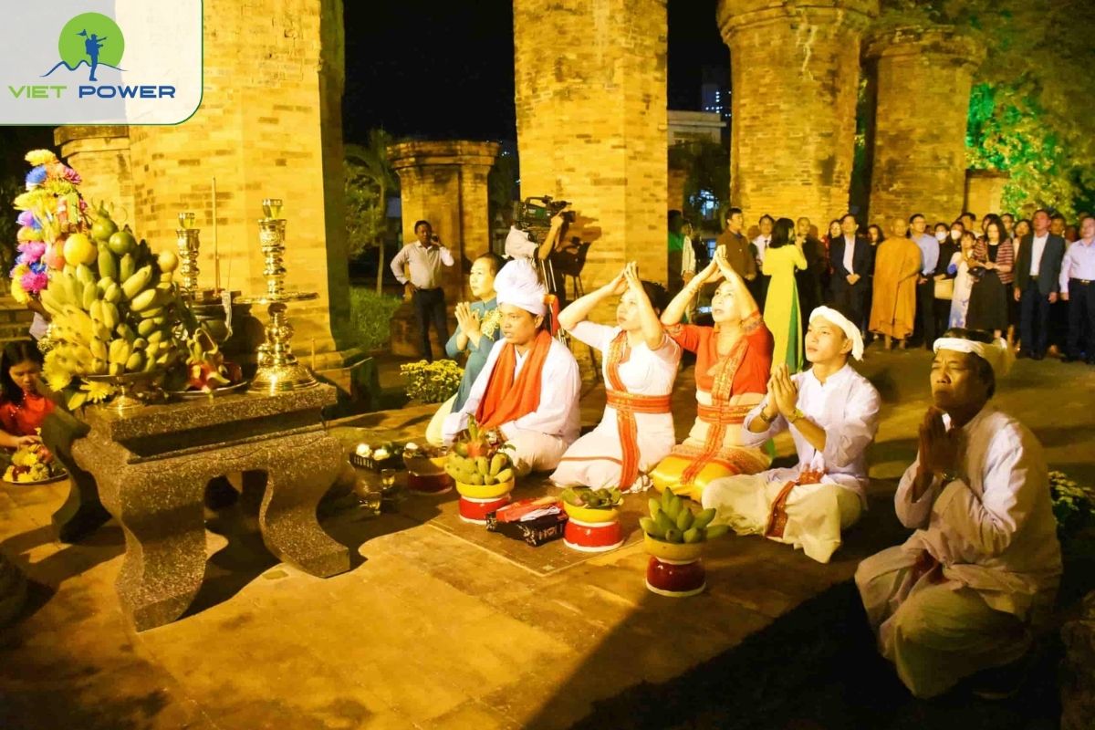Respectfully - bow and offer incense at Po Nagar Cham Tower