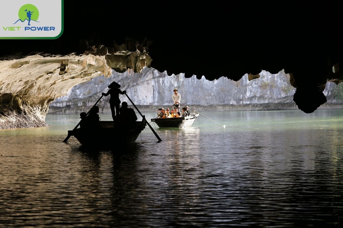 Visit Dark & Bright Cave by bamboo boat